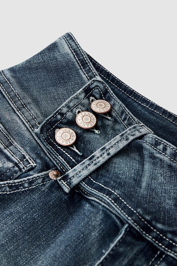 Vintage Knopf Mid Rise Schlagjeans