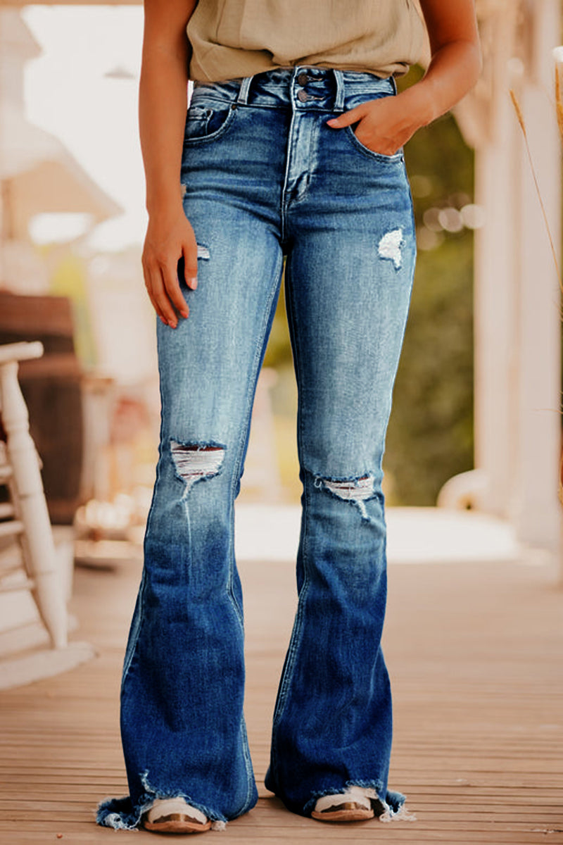 Stone Washed Flared Jeans mit zerrissenen Knien und offener Saumkante